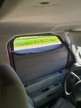 Load image into Gallery viewer, window cover top section folded down for ventilation